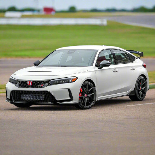 11th Generation 2023+ Honda Civic Type R FL5 2.0T in Championship White paint color parked on a race track tuned with a Hondata FlashPro purchased from Vtec Slayer.